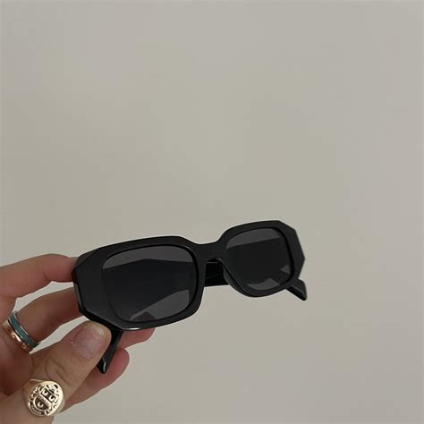 prada logo rubbing off sunglasses|Prada lookup.